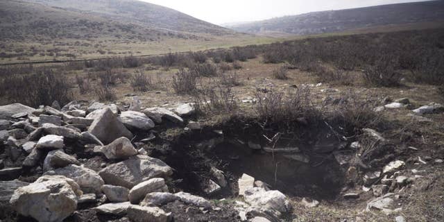 A recently looted tomb in Northwest China (Trevor Wallace)