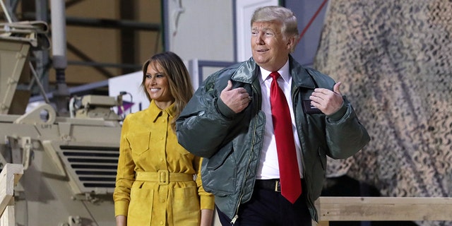  President Donald Trump delivers a speech to US troops during an unannounced visit to Al Asad Air Base, Iraq, on 26 December 20 18. REUTERS / Jonathan Ernst - RC1DDA2CDD00 