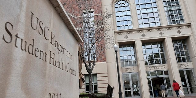 Detectives were trying to determine whether nude photographs linked to former USC gynecologist Dr. George Tyndall show any of the hundreds of women who allege he sexually harassed them during examinations.