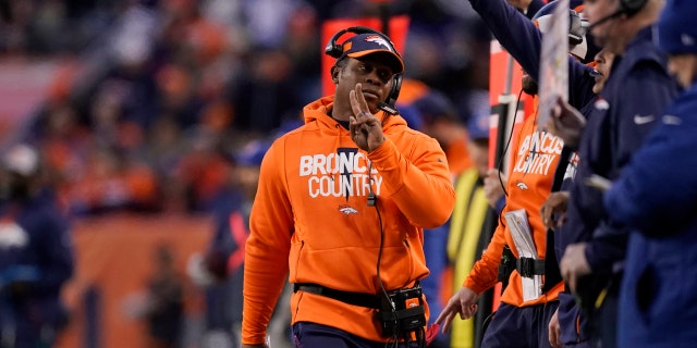 Denver Broncos head coach Vance Joseph, center, reacts on the sideline during the second half of an NFL football game against the Los Angeles Chargers, Sunday, Dec. 30, 2018, in Denver.