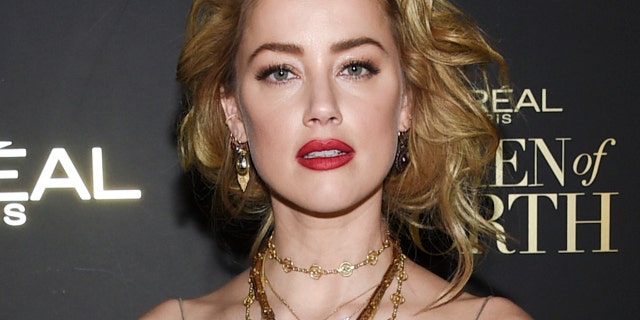 Actress Amber Heard attends the 13th annual L'Oreal Women of Worth Awards at The Pierre Hotel on Wednesday, Dec. 5, 2018, in New York.