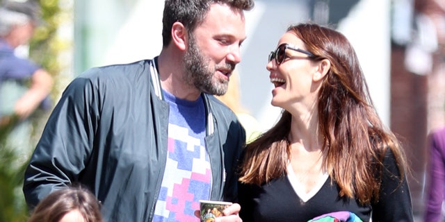 Jennifer Garner and Ben Affleck get close during their Sunday church outing with their kids.