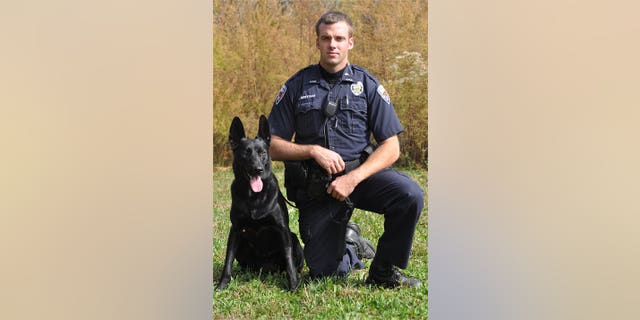 Sgt. Benton Bertram and K9 Kubo as seen in this police department photo.