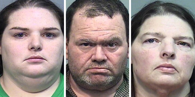 33-year-old Candice Crocker (left), 33, Elwyn Crocker (center), 49, and Kim Wright, 50 were charged with concealing the death of another and cruelty to children in the first degree Thursday after police found two bodies in their backyard.