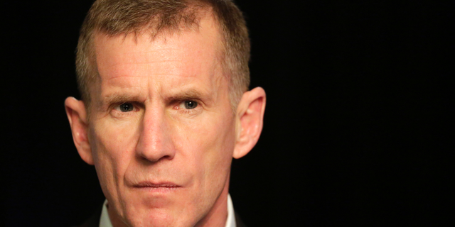 FILE- In this Jan. 7, 2013, file photo retired Gen. Stanley McChrystal reacts during an interview with The Associated Press in New York. The former top U.S. commander in Afghanistan says that withdrawing up to half the 14,000 American troops serving there reduces the incentive for the Taliban to negotiate a peace deal after more than 17 years of war. McChrystal says on ABC’s “This Week” that the U.S. has “basically traded away the biggest leverage point we have.” (AP Photo/Mark Lennihan, File)
