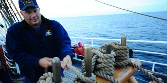 John Stanley Presnar, 44, had served in the U.S. Coast Guard since 2001 as an electronics technician, officials say.