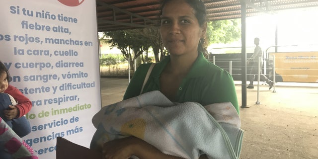 30-year-old Marie Chaparral, routinely treks across to Colombia to seek healthcare and vaccines for her three young children, one being only a few weeks old.