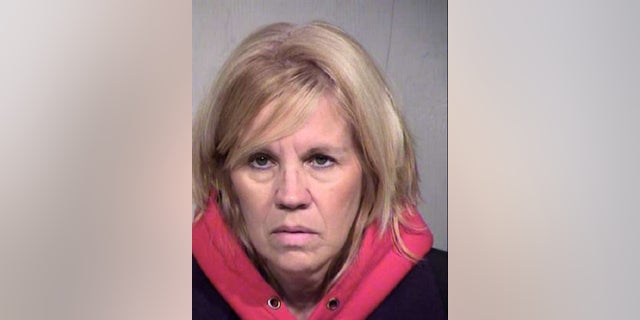 Deborah Britton, of Chandler, Ariz., is charged with unlawful distribution of nude images and harassment, a report said.