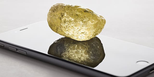 The yellow diamond is about the size of a chicken egg--