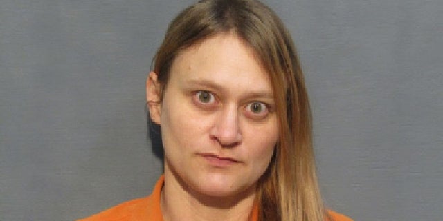 Amanda Gail Oakes, 36, pleaded guilty to manslaughter and corpse abuse earlier this week and was sentenced to 99 years in prison. She agreed to testify against Mathis at his trial in November.
