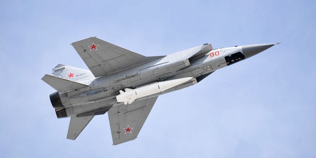 Mikoyan MiG-31K fighter jet with Kinzhal hypersonic missiles flies over Moscow's Red Square marking the 73rd anniversary of the victory over Nazi Germany in World War II.