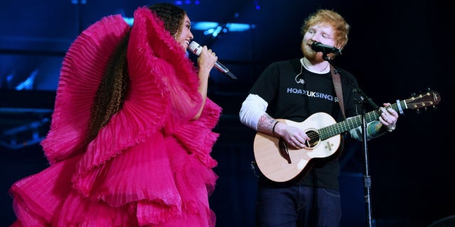 Beyoncé and Ed Sheeran performing together at the Global Citizen Festival in Johannesburg, South Africa, on Sunday, Dec. 2, 2018.