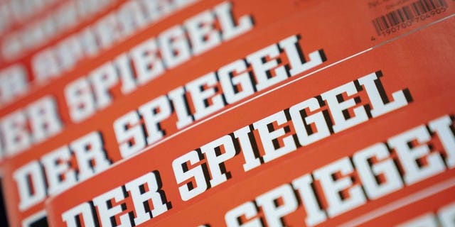 The Dec. 19, 2018 photo shows issues of German news magazine Spiegel arranged on a table in Berlin. (Kay Nietfeld/dpa via AP)