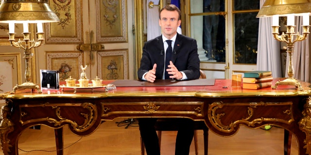 Facing exceptional protests, French President Emmanuel Macron is promising to speed up tax relief for struggling workers and to scrap a tax hike for retirees.