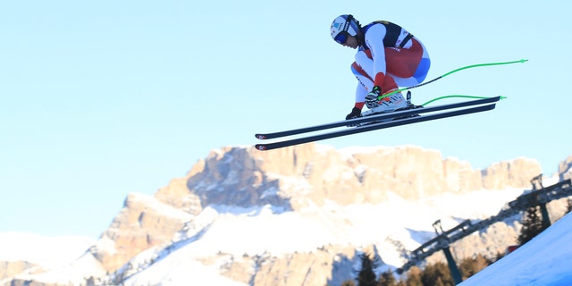 Switzerland's Marc Gisin speeds down the course during a men's World Cup downhill, in Val Gardena, Italy, Saturday, Dec. 15, 2018.
