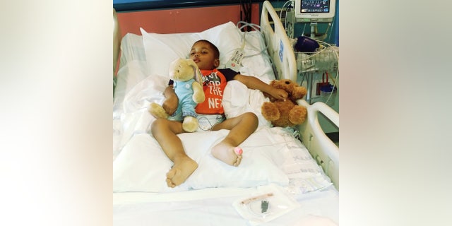 Andre Carson has been unable to speak or walk due to a rare brain-eating disease that he developed after contracting the flu.