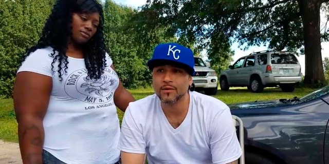 In this June 21, 2017 image taken from video, Richard Anthony Jones, right, with his girlfriend Nakisha Duncan of Kansas City at his side, talks about being released from prison in Kansas City, Mo.