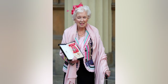 FILE - Nov. 16, 2017 file photo of Dame June Whitfield after she was made a dame. British actress and comedic star June Whitfield, whose long career included memorable roles in TV series “Absolutely Fabulous” and “Terry and June,” has died. She was 93. (Jonathan Brady/PA Wire/PA via AP, File)