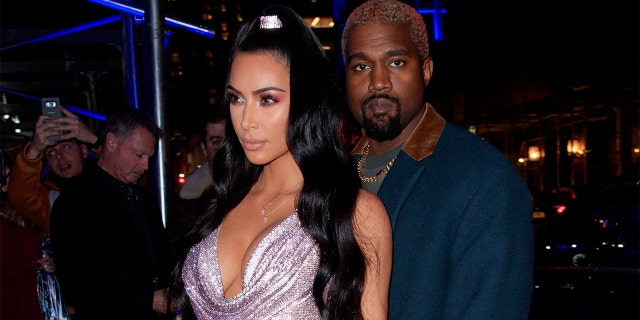 NEW YORK, NY - DECEMBER 02: Kim Kardashian and Kanye West arrive at a Versace Fashion show on December 2, 2018 in New York City. (Photo by Gotham/GC Images)