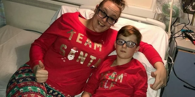 Jenna Probert with her son, Reece, pictured in the hospital.