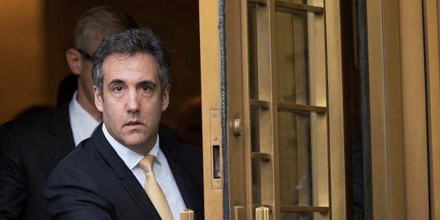 Michael Cohen leaves Federal court, in New York.