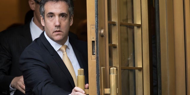 Michael Cohen leaves Federal court, in New York.