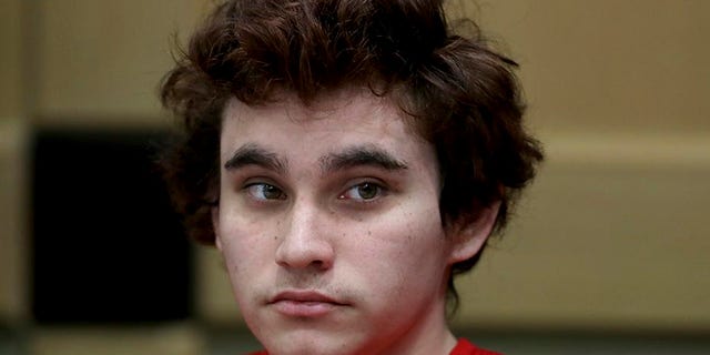 Florida school shooting suspect Nikolas Cruz sits in a courtroom in November in Fort Lauderdale, Fla.