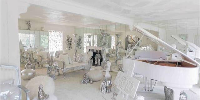 The home comes "as is," which includes a Kohler Campbell baby grand player piano. (Realtor.com)