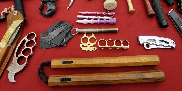 It's now legal to own nunchucks in the state of Arizona. Governor Doug Ducey signed legislation on Friday to remove nunchucks from the list of illigal deadly weapons banned in the state. . (AP Photo/Elaine Thompson)