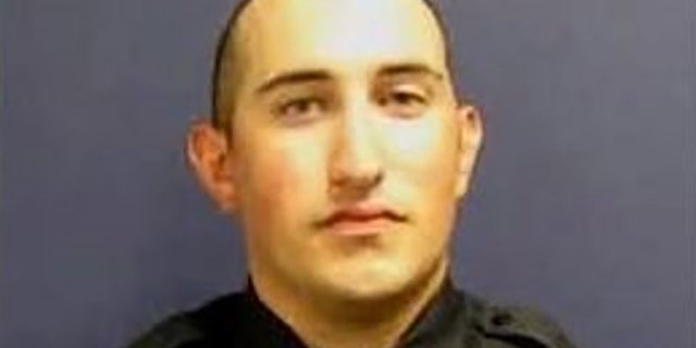 Officer John Daily suffered severe burns in a crash, authorities say. (Houston Police Department)