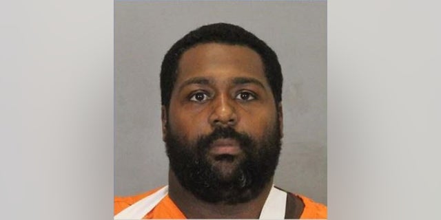 John Ezell Jr., 36, is accused of shooting a police officer in Omaha