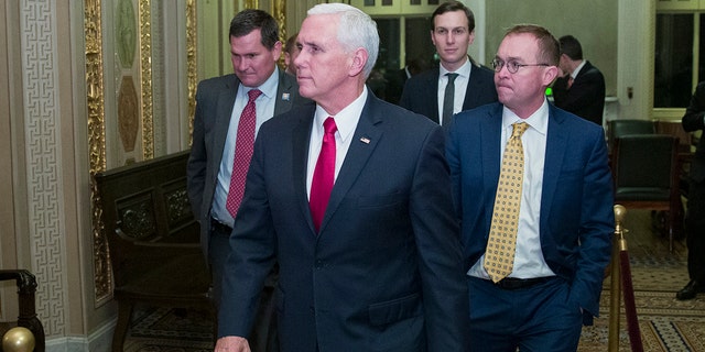 Vice President Mike Pence, second from left, with White House senior adviser Jared Kushner, and incoming White House Chief of Staff Mick Mulvaney as they depart for the night without a bill that would pay for President Trump's border wall and avert a partial government shutdown, on Capitol Hill, Friday, Dec. 21, 2018 in Washington. (Associated Press)