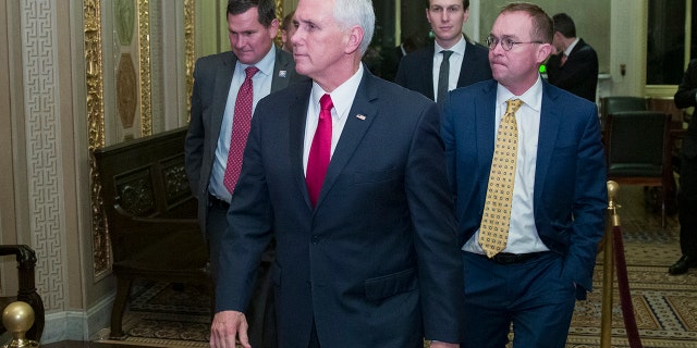 Vice President Mike Pence, second from left, with White House senior adviser Jared Kushner, and incoming White House Chief of Staff Mick Mulvaney as they depart for the night without a bill that would pay for President Trump's border wall and avert a partial government shutdown, on Capitol Hill, Friday, Dec. 21, 2018 in Washington. (Associated Press)