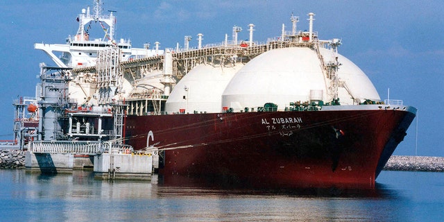 A​​​​​​a Qatari liquid natural gas tanker ship being loaded up with LNG at Raslaffans Sea Port, northern Qatar. (AP Photo, File)