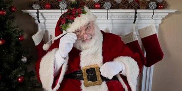 FILE: Santa visits a home. A substitute teacher in New Jersey will not be returning to the Montville Township Public Schools, the superintendent said Tuesday.