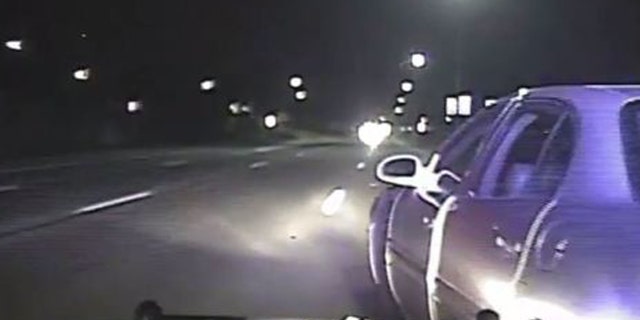 Wyoming Police Officer Tony Jacob used his patrol car to nudge another vehicle to get it to stop.