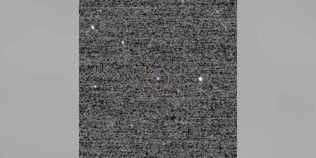 This is the first detection of Ultima Thule using the highest-resolution mode of the Long Range Reconnaissance Imager aboard the New Horizons spacecraft. Three separate images, each with an exposure time of 0.5 seconds, were combined to produce the image. (NASA/Johns Hopkins University Applied Physics Laboratory/Southwest Research Institute)
