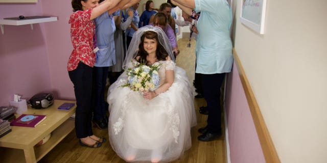 Tasha Burton, 36, was admitted to the inpatient unit at the Hospice of St Francis, in Berkhamsted, on Nov. 27, and on Nov. 28, she and her fiance, Daniel Corley, walked down the aisle.