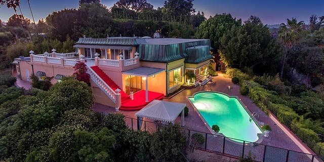 This classic 1950s Bel Air mansion is also rumored to be occupied by Howard Hughes and Elvis Presley. 