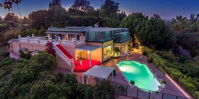 This classic 1950s Bel Air mansion is also rumored to be occupied by Howard Hughes and Elvis Presley.