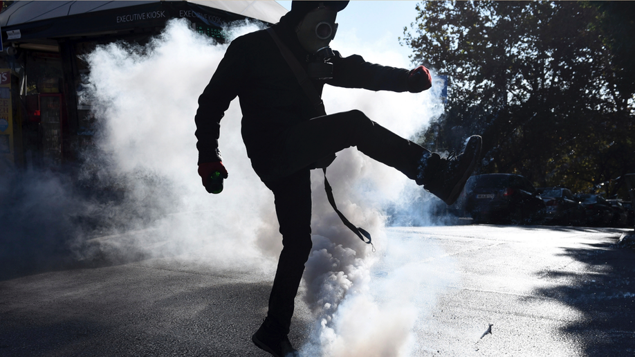 Greek protesters, police clash on teen death anniversary