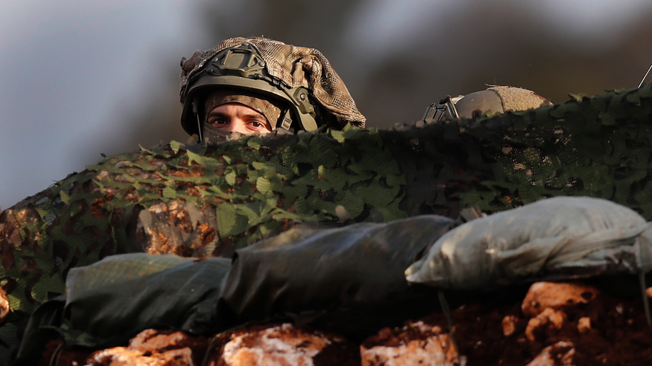 Tension as Israel rolls out barbed wire on Lebanon border