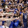 Duke fans cheer as Yale's Jordan Bruner waits to inbound the ball during the first half of an NCAA college basketball game in Durham, Dec. 8, 2018.