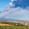 A column of smoke comes out of the Etna volcano in Catania, Italy, Dec. 24, 2018. 