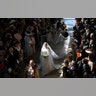 Meghan Markle walks down the aisle as she arrives in St George's Chapel at Windsor Castle for her wedding to Prince Harry in Windsor, Britain, May 19, 2018. 