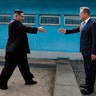 North Korean leader Kim Jong Un prepares to shake hands with South Korean President Moon Jae-in at the border village of Panmunjom in the Demilitarized Zone, April 27, 2018. 