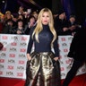What is Katie Price wearing? The British star donned a bizarre gold skirt for this week's Britain’s National Television Awards. Get a new stylist pronto Katie! Click here for more star sightings on ETOnline.com.