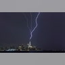 A lightning bolt strikes One World Trade Center during an electrical storm over New York City, October 2, 2018. (Photo by Gary Hershorn)