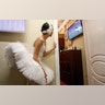 A ballerina watches a broadcast of the World Cup quarter-final match between Russia and Croatia at the Mikhailovsky Theatre in Saint Petersburg, Russia, July 7, 2018. 
