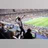 French President Emmanuel Macron celebrates as France defeats Croatia in the 2018 soccer World Cup final in Moscow, July 15, 2018. 